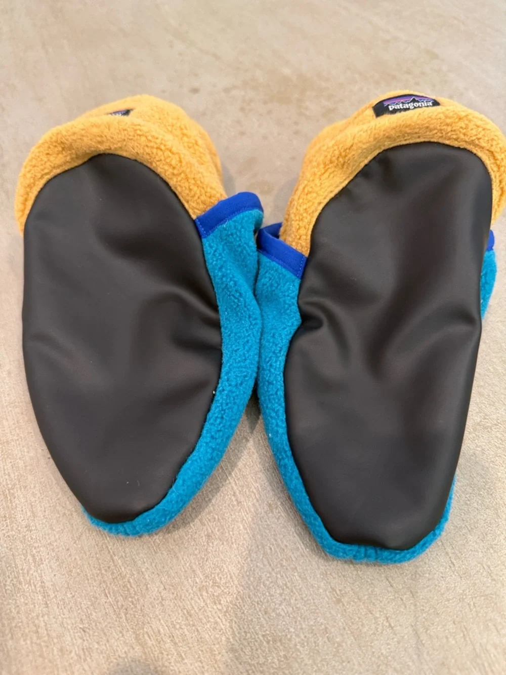 Patagonia Teal Kids Fleece Slippers with Blue and Yellow Accents